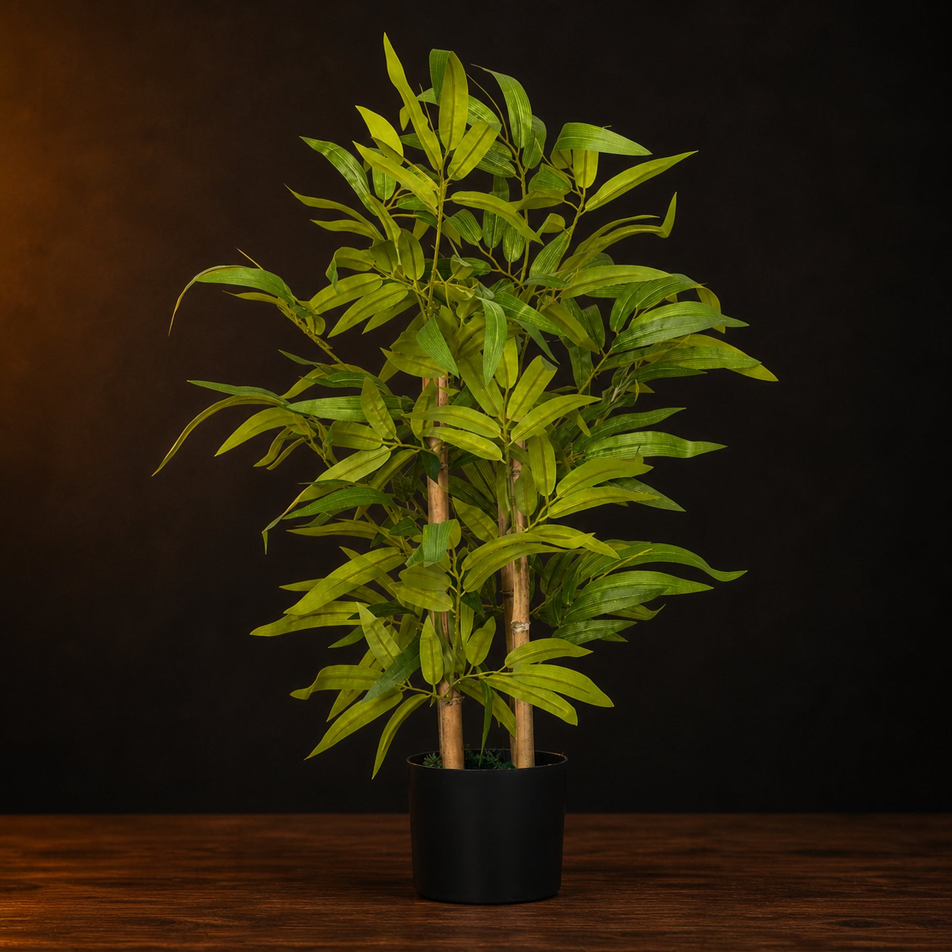 Artificial Bamboo Table Plant on a dark charcoal studio background
