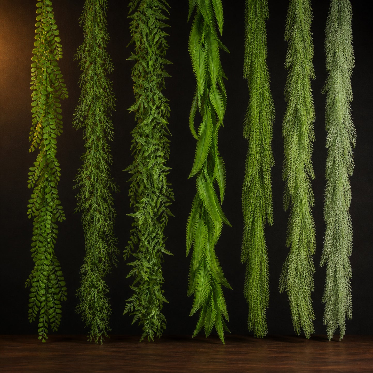 Artificial Trailing Foliage Vine on a dark charcoal studio background