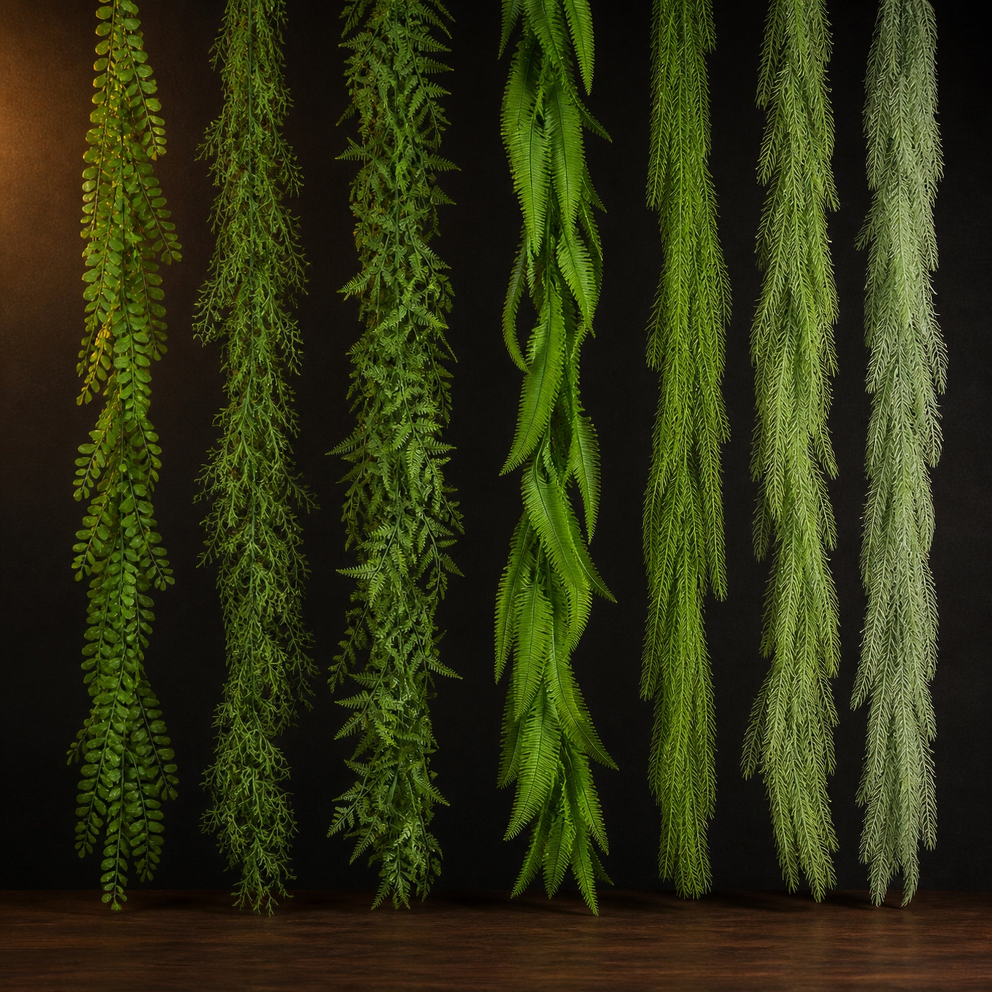 Artificial Trailing Foliage Vine on a dark charcoal studio background