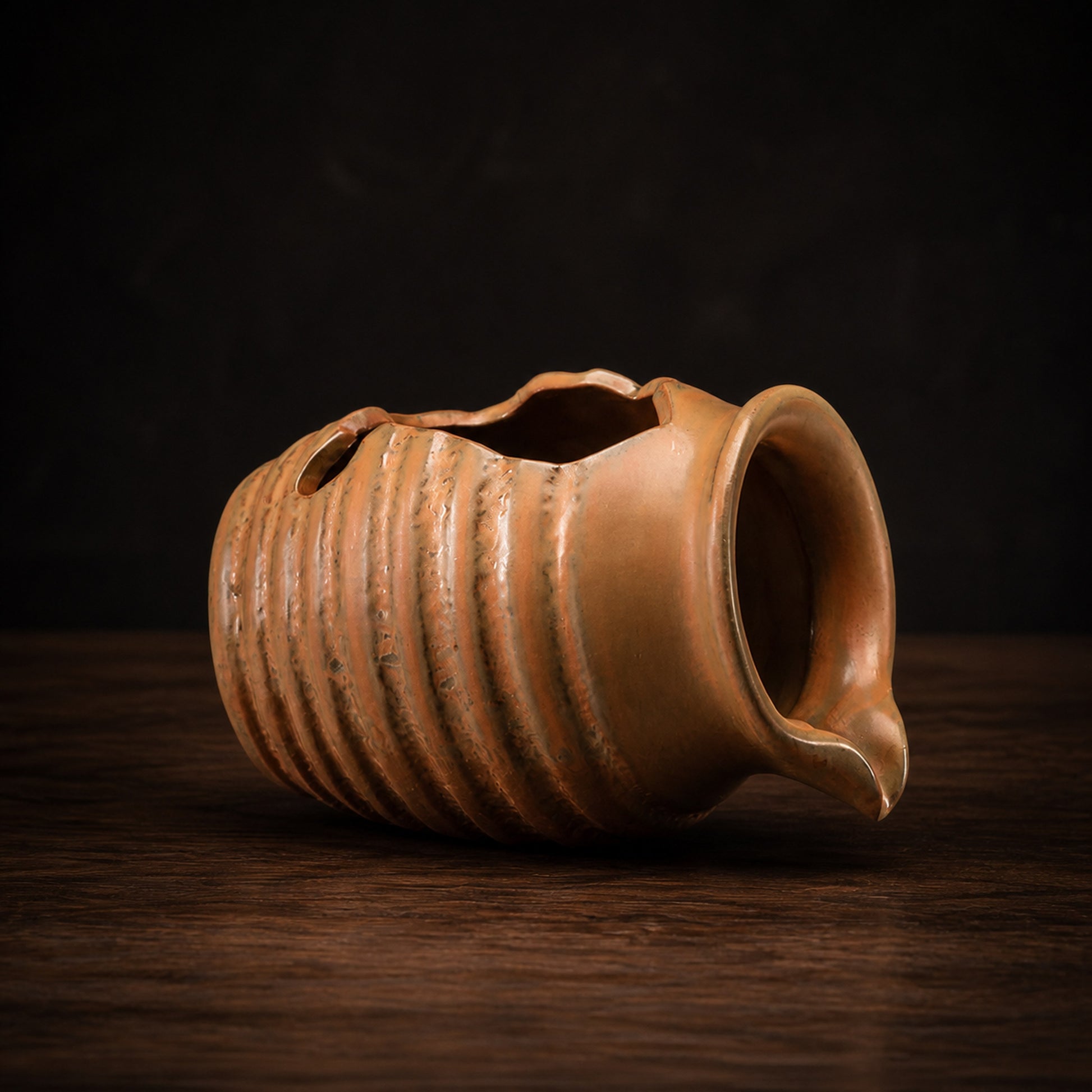 Ceramic Water Feature Jug on a dark charcoal studio background