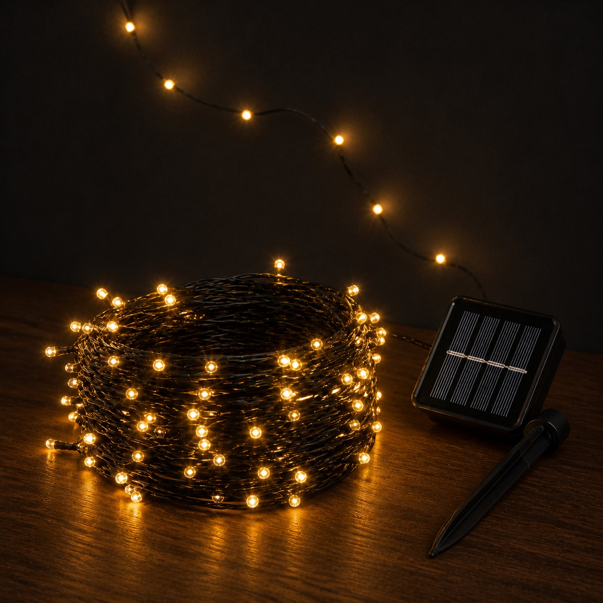 Solar Garden Fairy Lights on a dark charcoal studio background