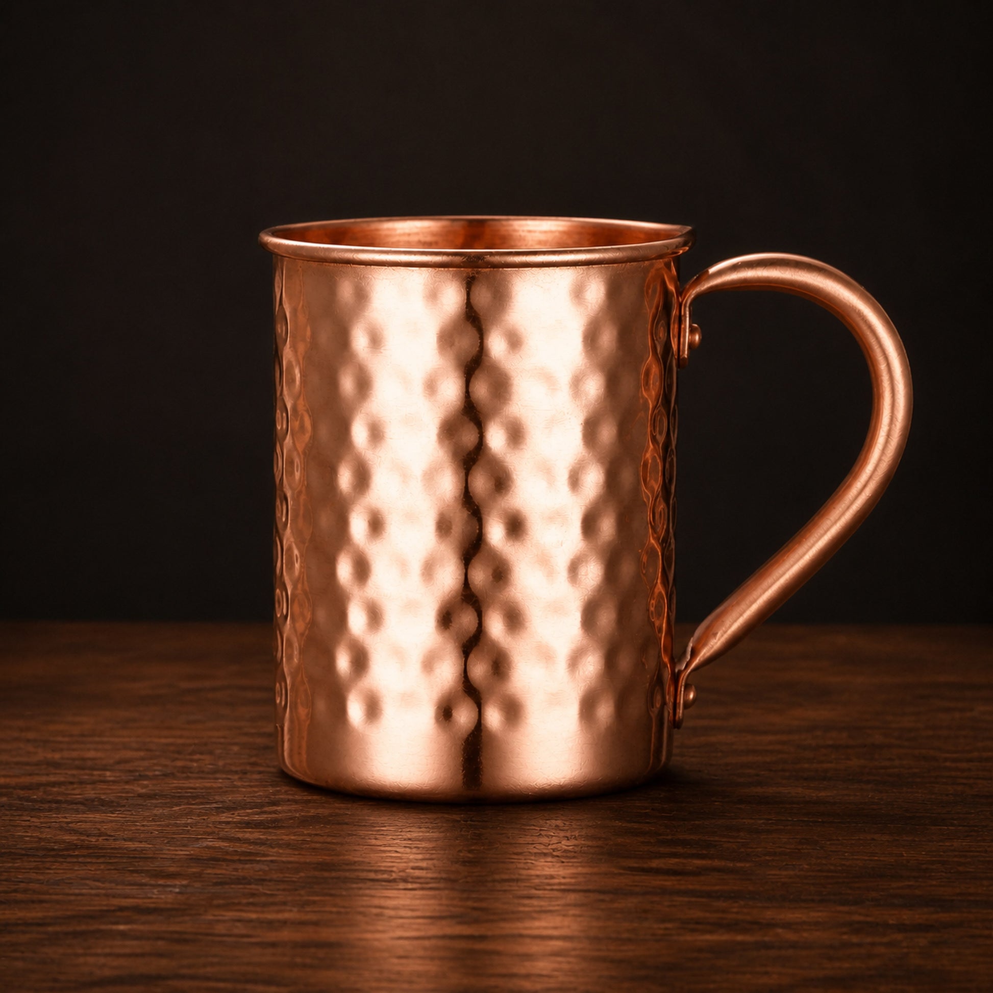Hammered Copper-Finish Mug on a dark charcoal studio background