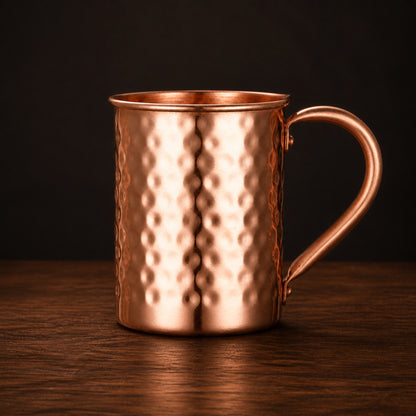 Hammered Copper-Finish Mug on a dark charcoal studio background