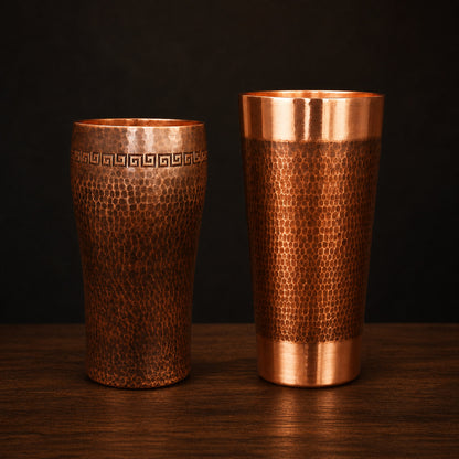 Greek-Key Copper Tumbler on a dark charcoal studio background