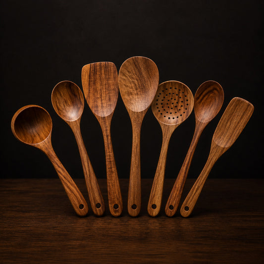Wooden Cooking Utensils on a dark charcoal studio background
