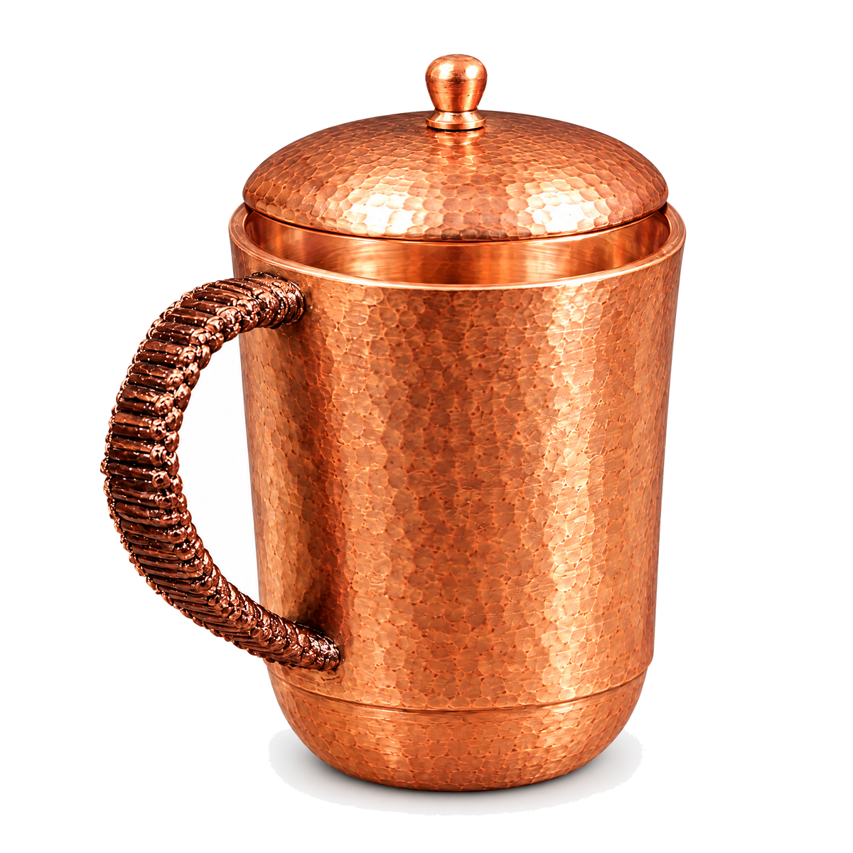 Hammered copper water tumbler on a white background