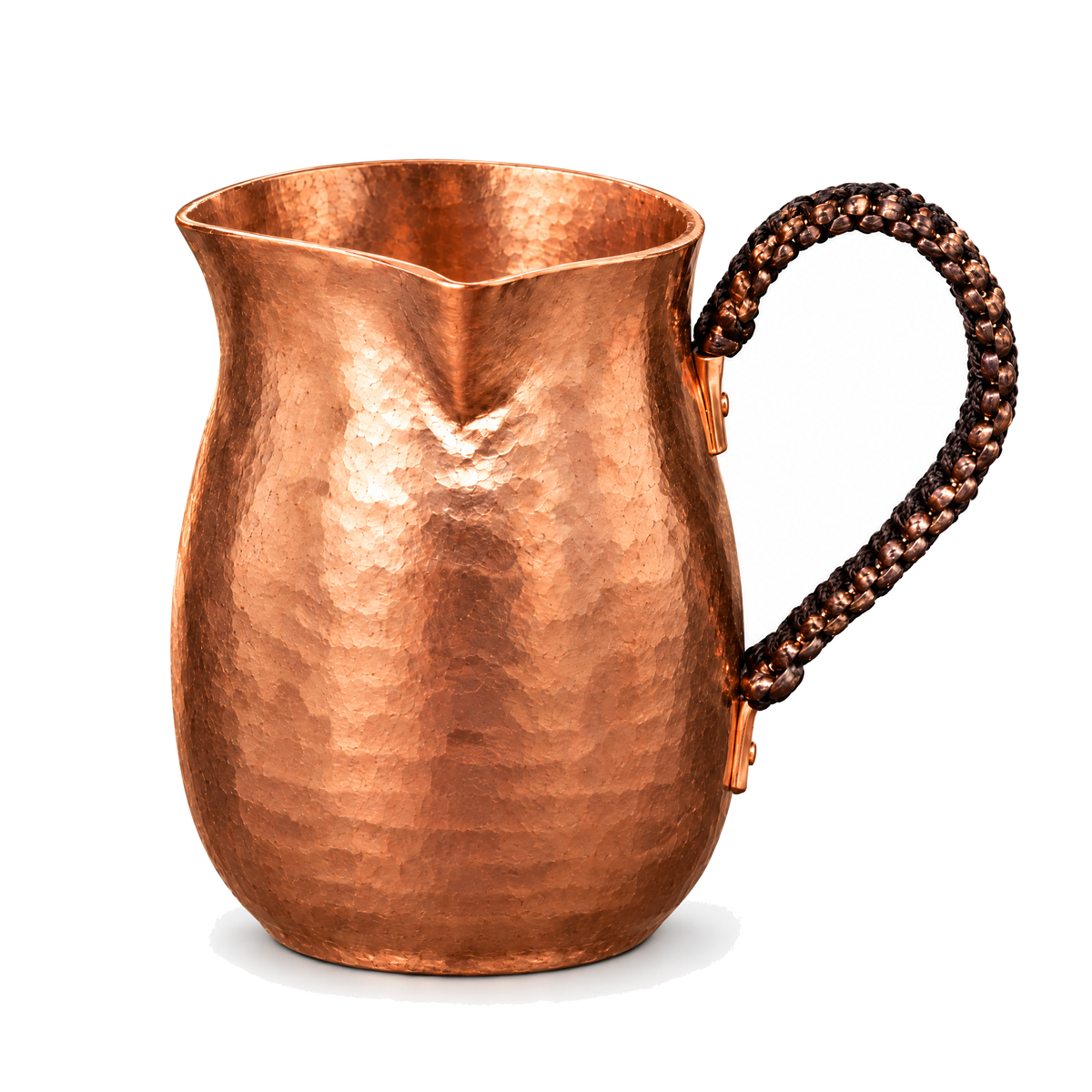 Hammered copper milk and coffee pot on a white background