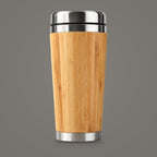 Bamboo insulated travel mug on a plain mid grey background
