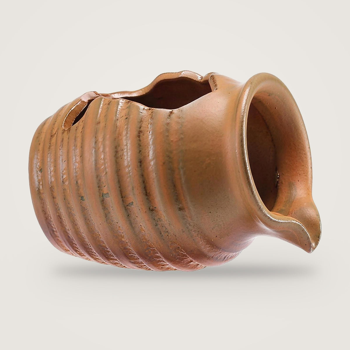 Ceramic water feature jug, Matte Amber option, on a plain light grey background