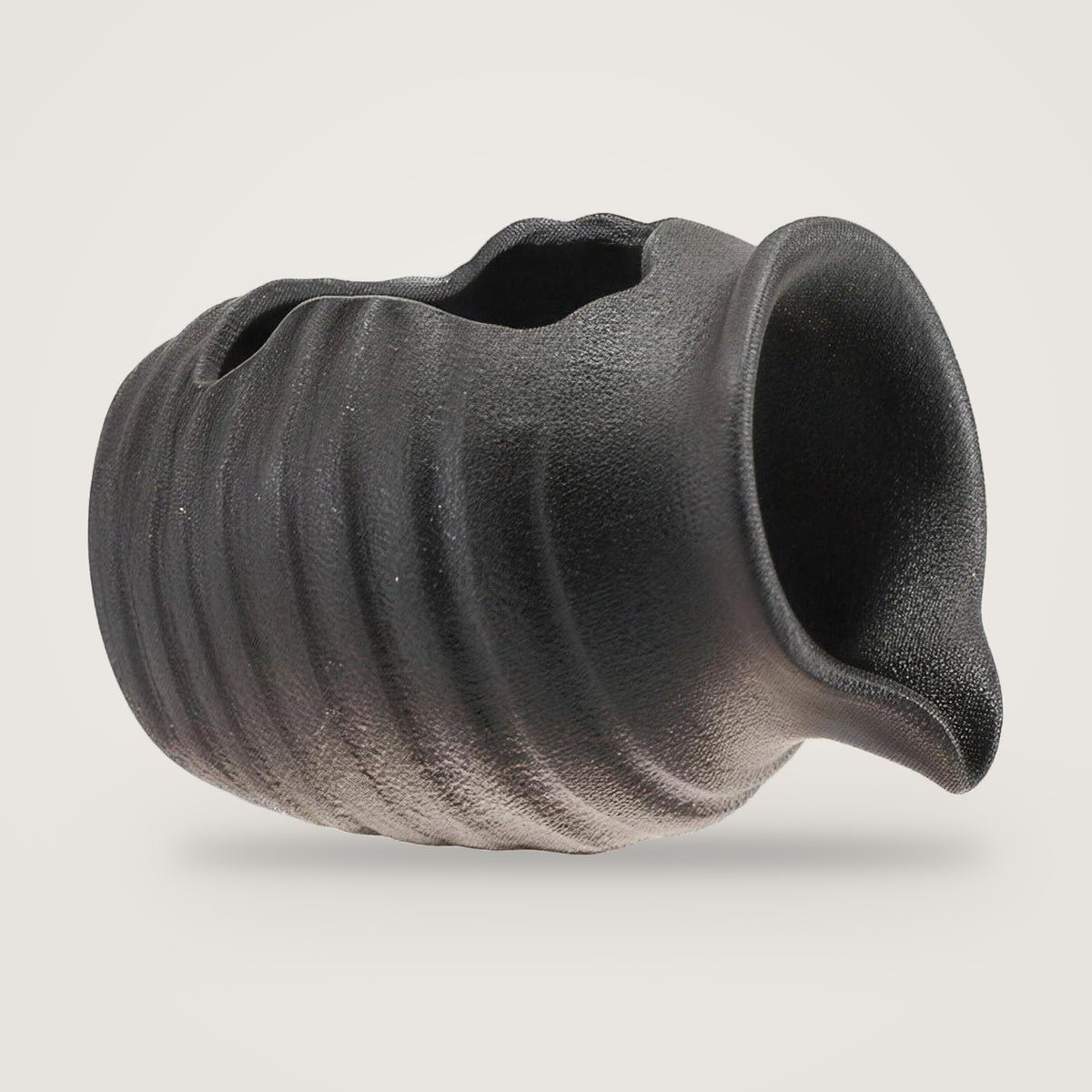 Ceramic water feature jug, Matte Black option, on a plain light grey background