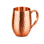 Hammered copper cocktail cup on a white background