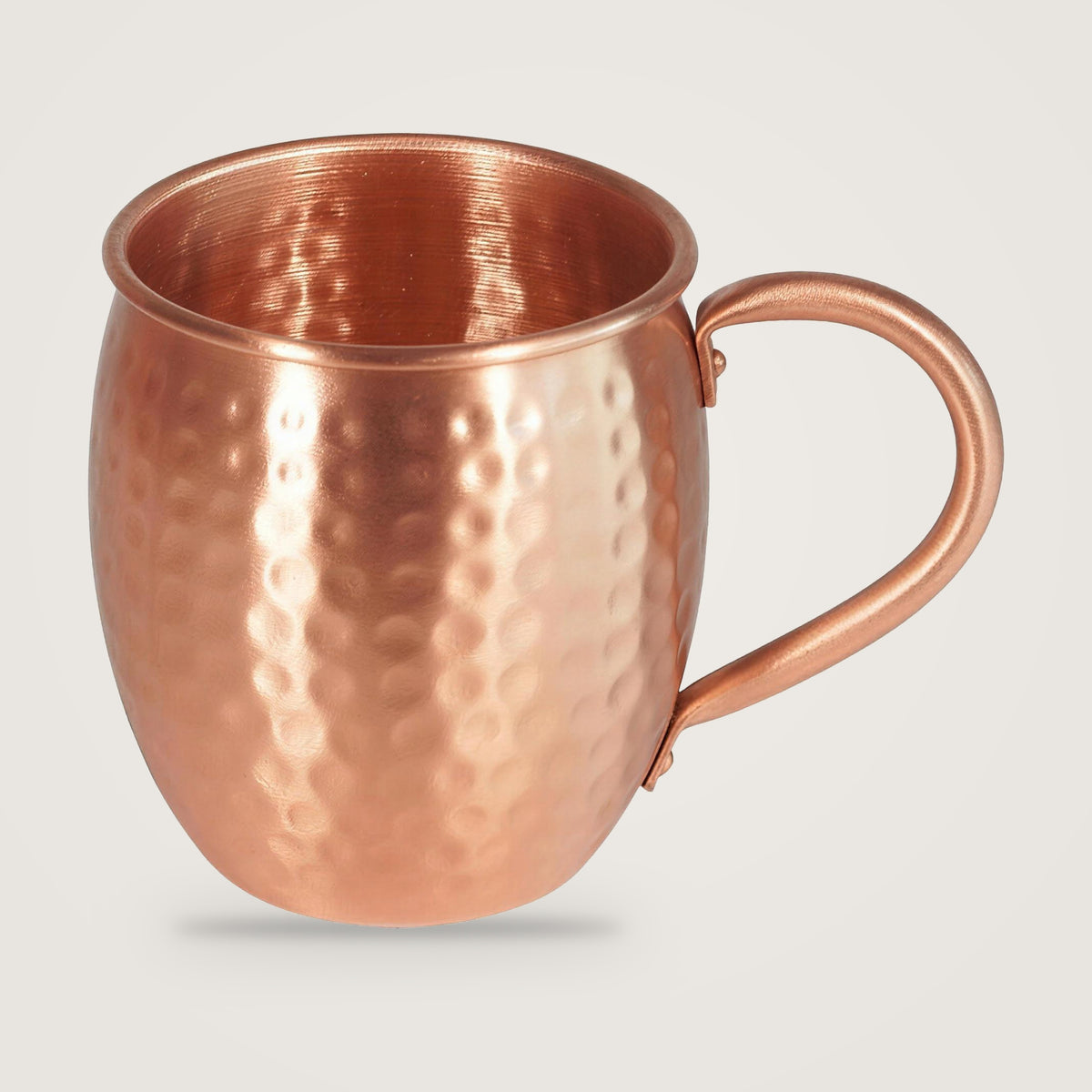 Hammered solid copper mug, 1 Mug option, on a plain light grey background