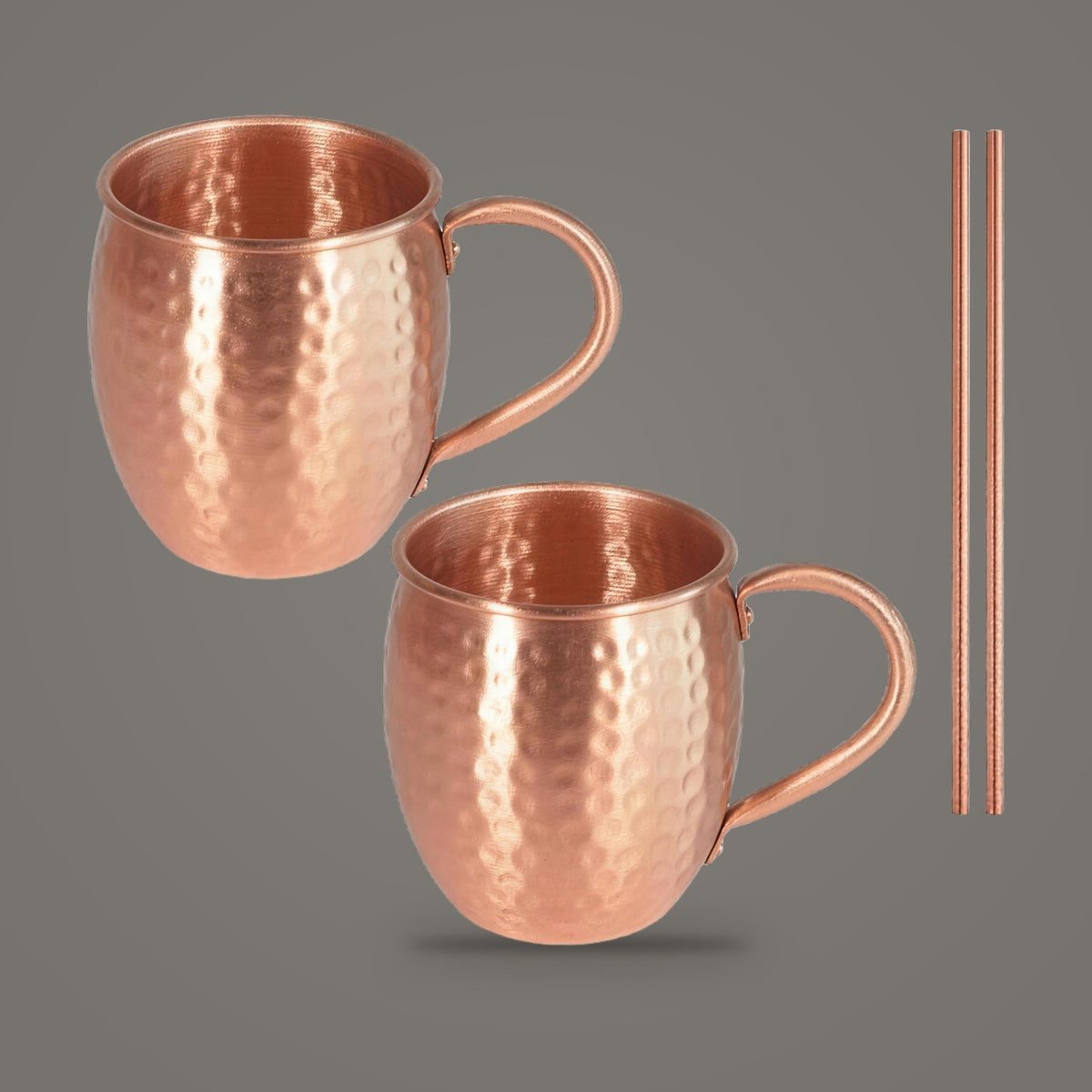 Hammered solid copper mug, 2 Mugs + Straws option, on a plain mid grey background