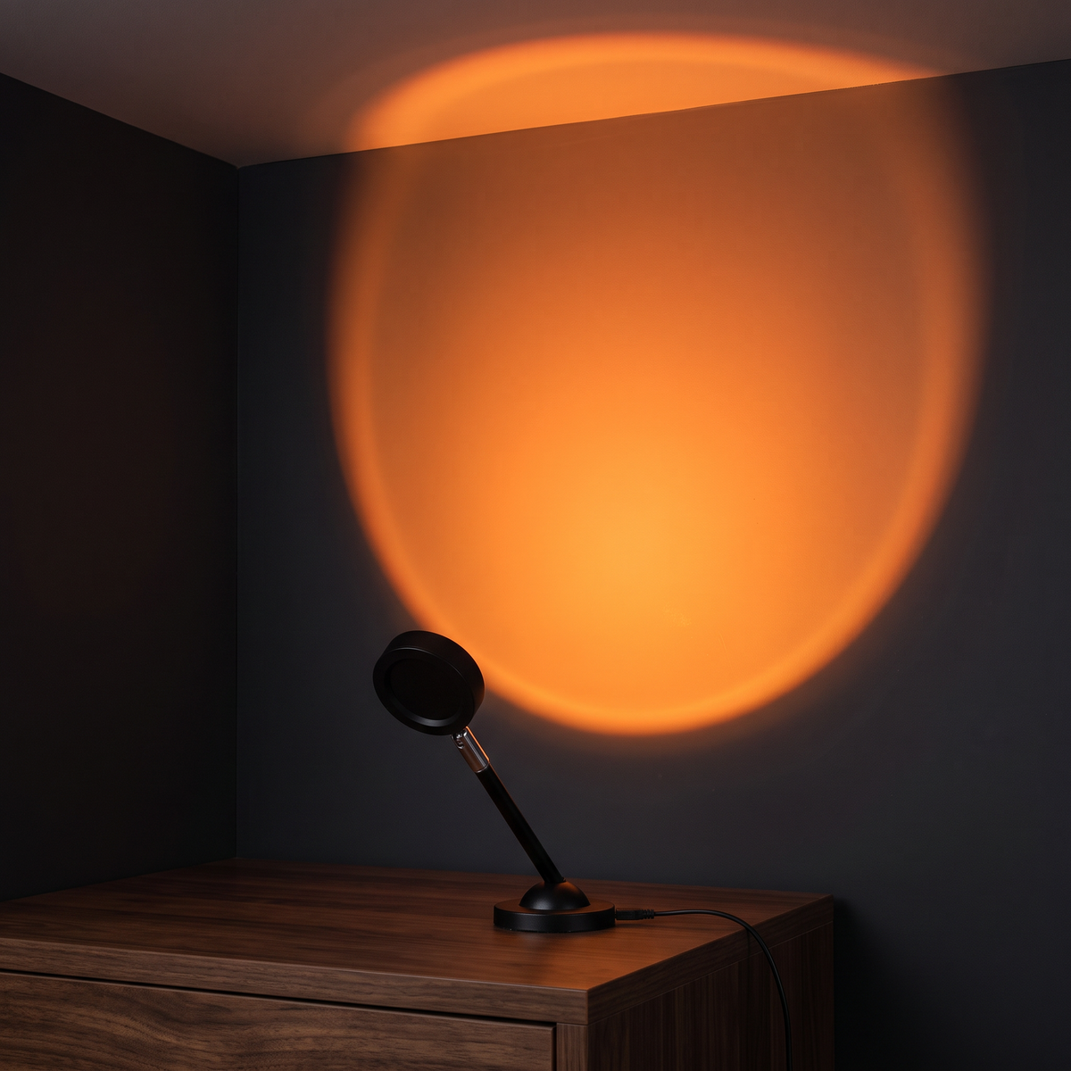 Large sunset halo projected across a dark wall and ceiling