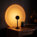 USB Sunset Projector lighting a desk corner at night