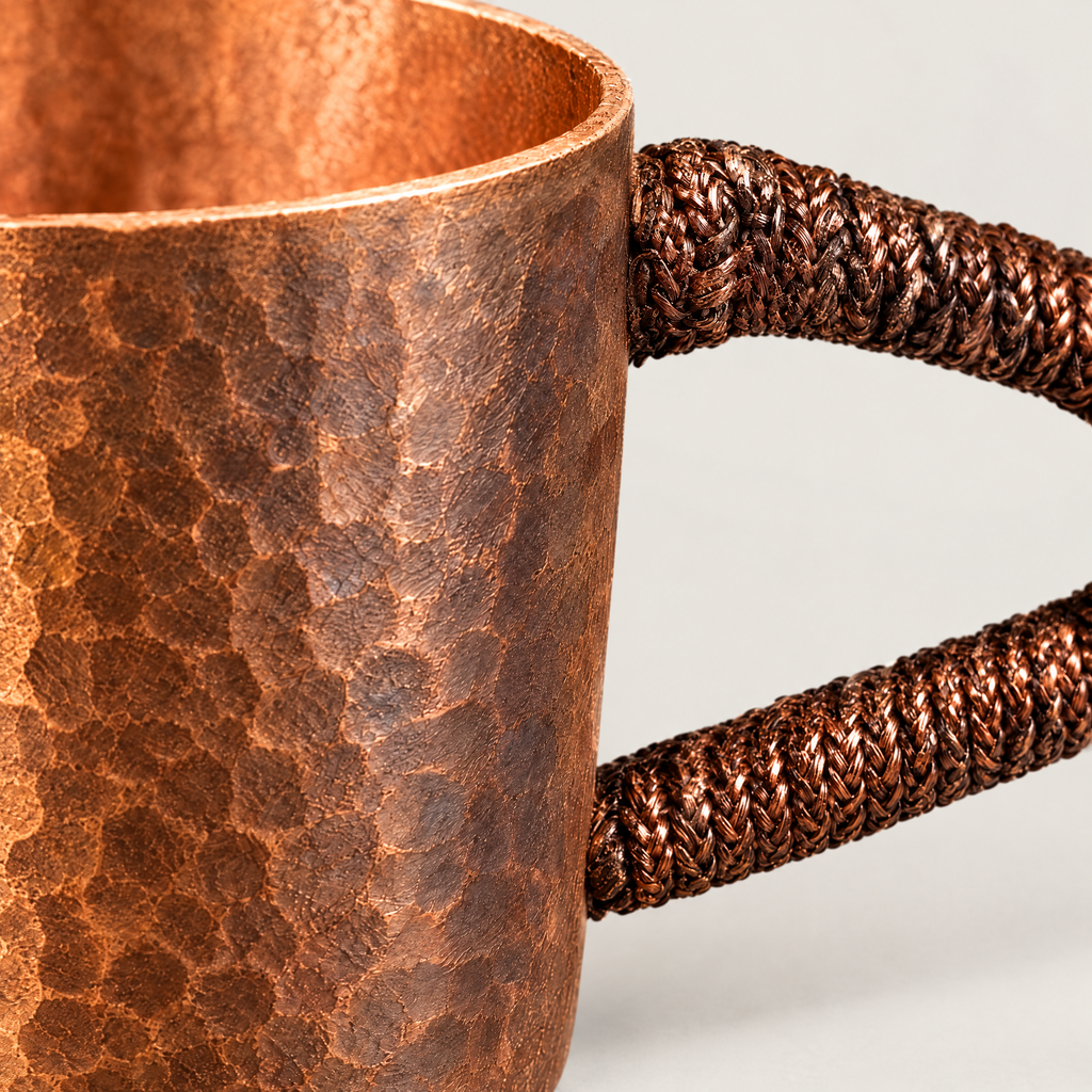 Close-up of the woven handle wrap and hammered texture