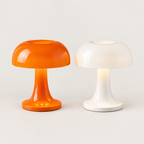 USB mushroom table lamp shown in both orange and white finishes