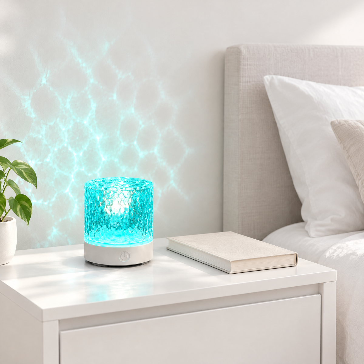 Water ripple projector on a bedside table casting ripples on the wall