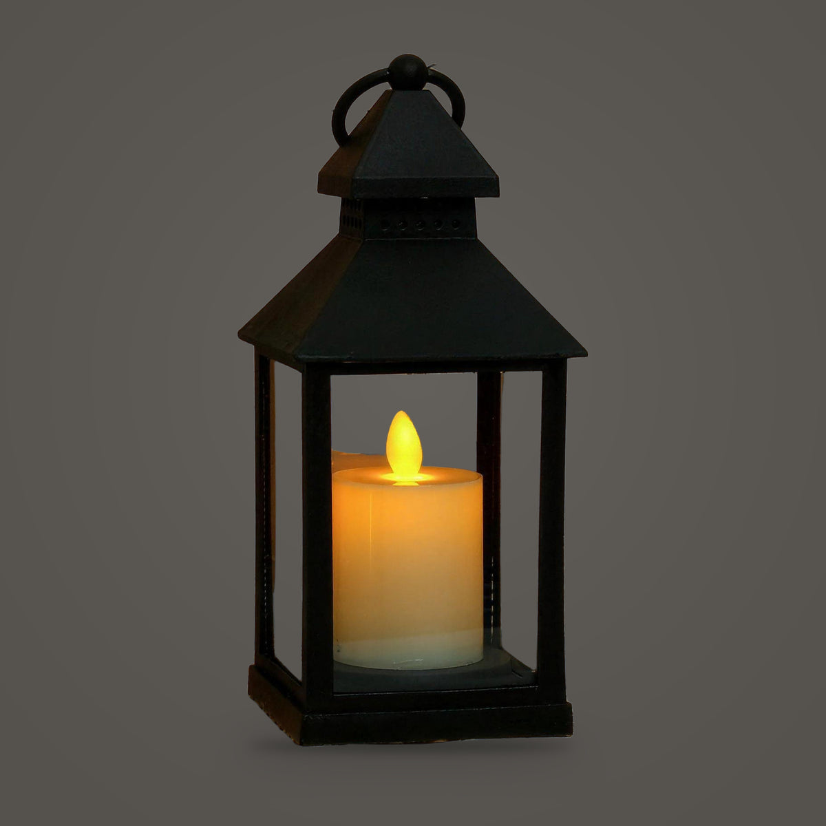 LED candle lantern, Black Style A Standard option, on a plain warm grey background