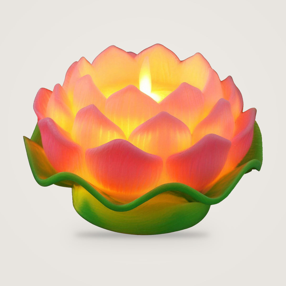 LED lotus candle, Pink option, on a plain light grey background
