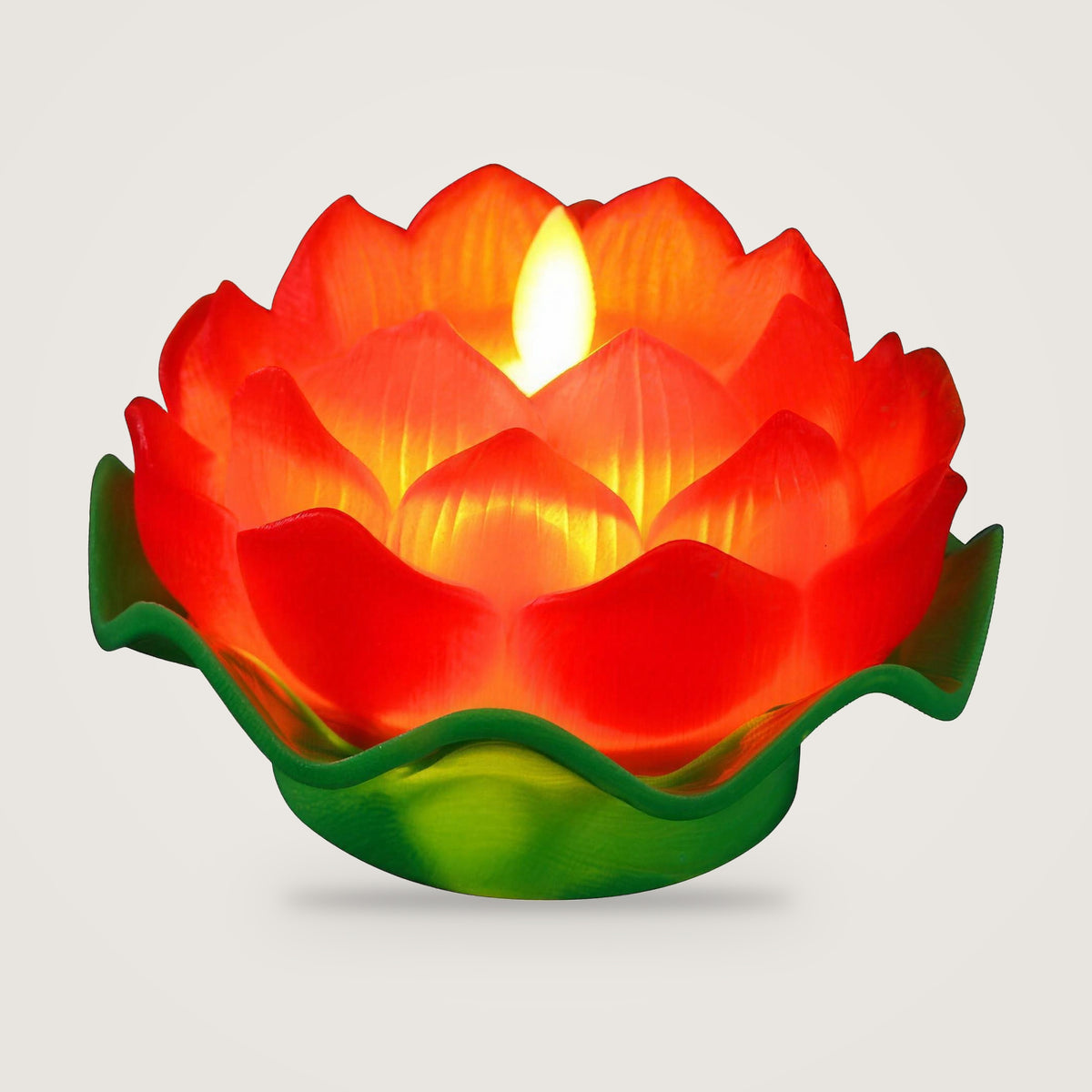 LED lotus candle, Red option, on a plain light grey background