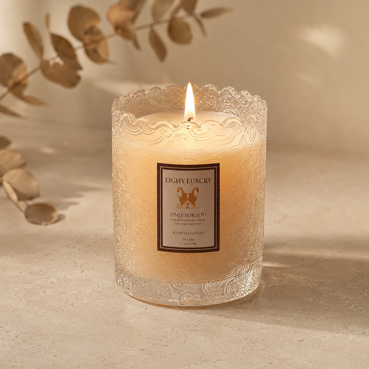Luma Embossed Glass Scented Candle in a warm neutral studio setting