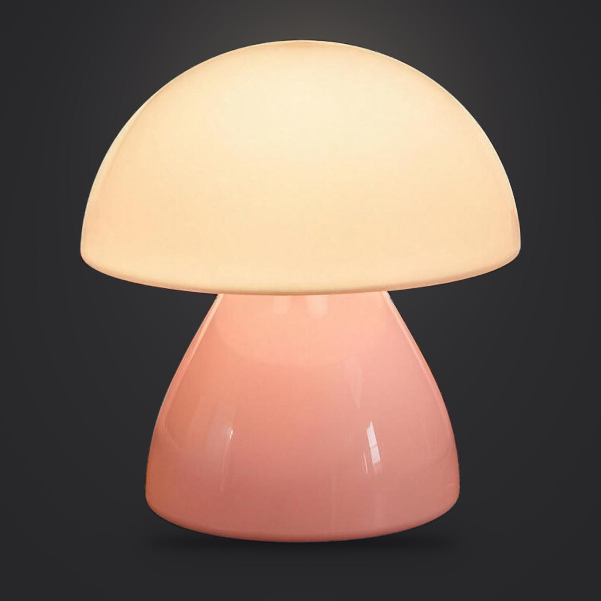 Rechargeable cordless table lamp, Pink option, lit with a soft glow, on a plain charcoal background