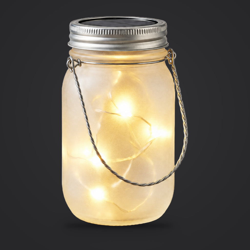 Solar mason jar lantern on a plain charcoal background