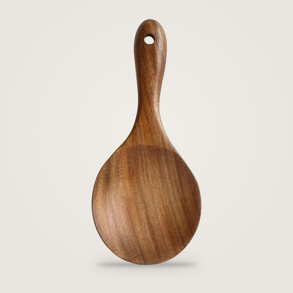 Wooden cooking utensils, Rice Paddle option, on a plain light grey background
