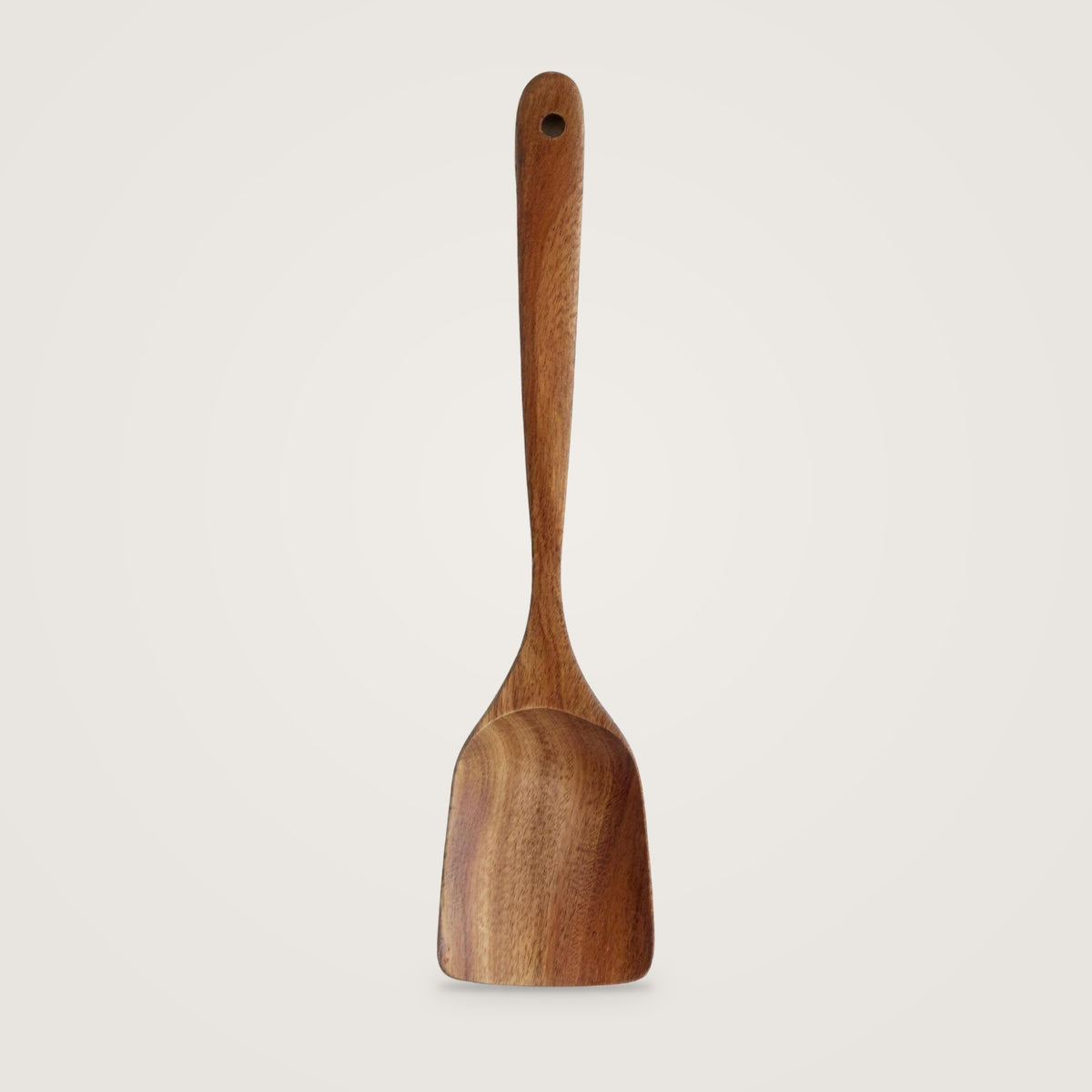 Wooden cooking utensils, Wooden Spatula option, on a plain light grey background